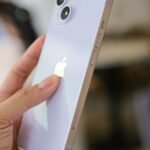 iPhone 14 on hands