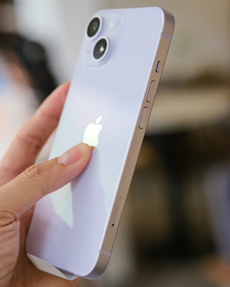 iPhone 14 on hands